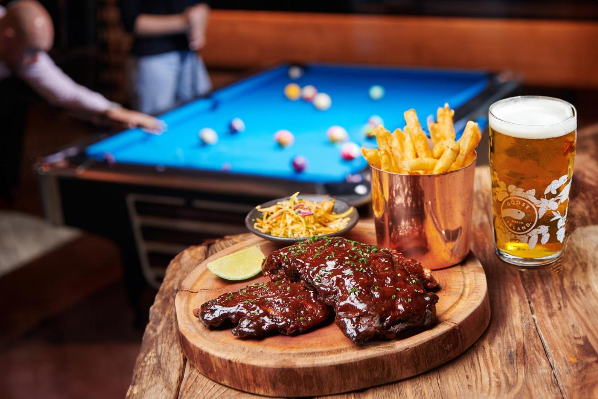Five Jumeirah Village Dubai Exterior photo A plate of pork ribs