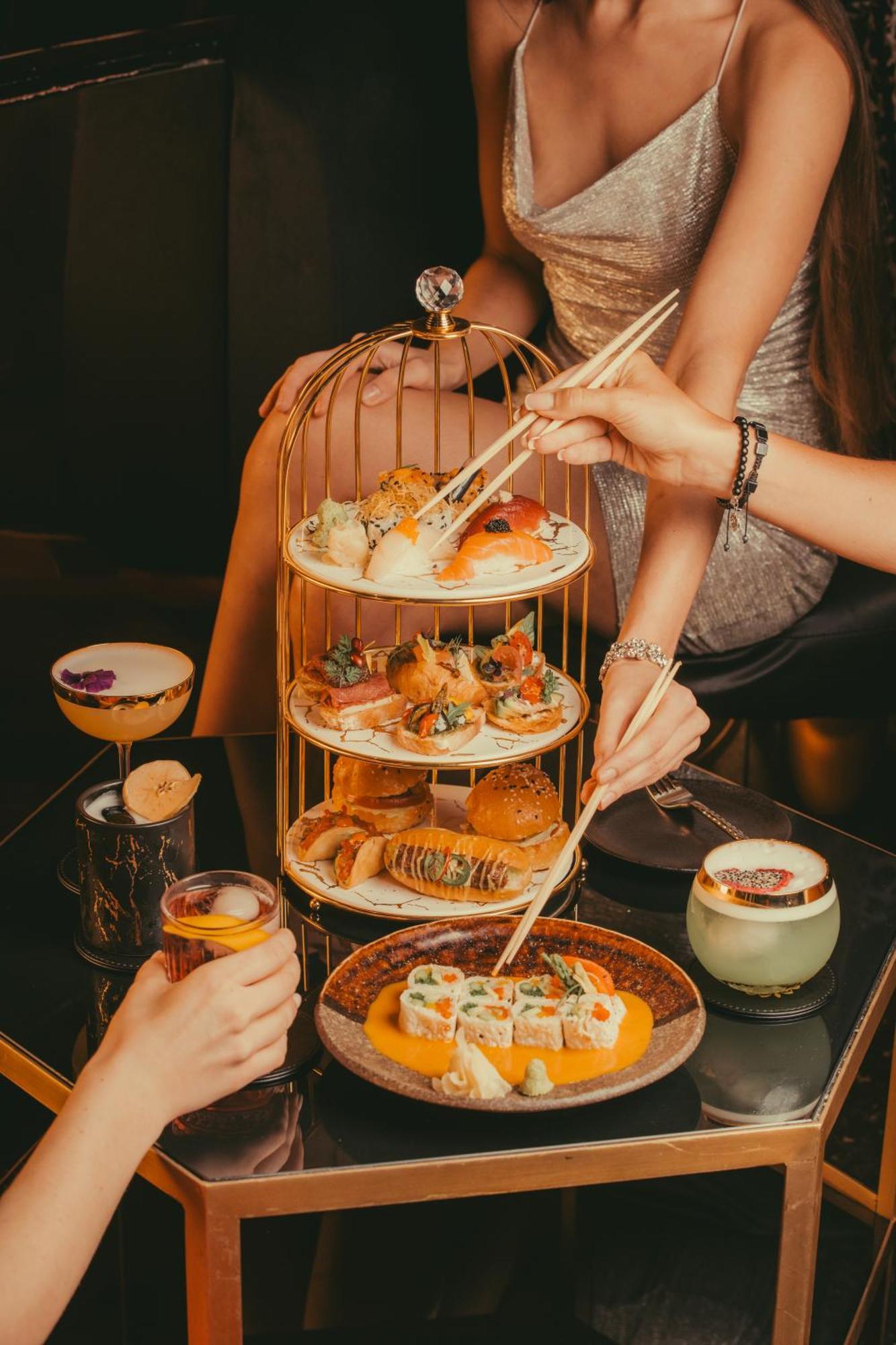 Five Jumeirah Village Dubai Exterior photo Afternoon tea at the Mandarin Oriental