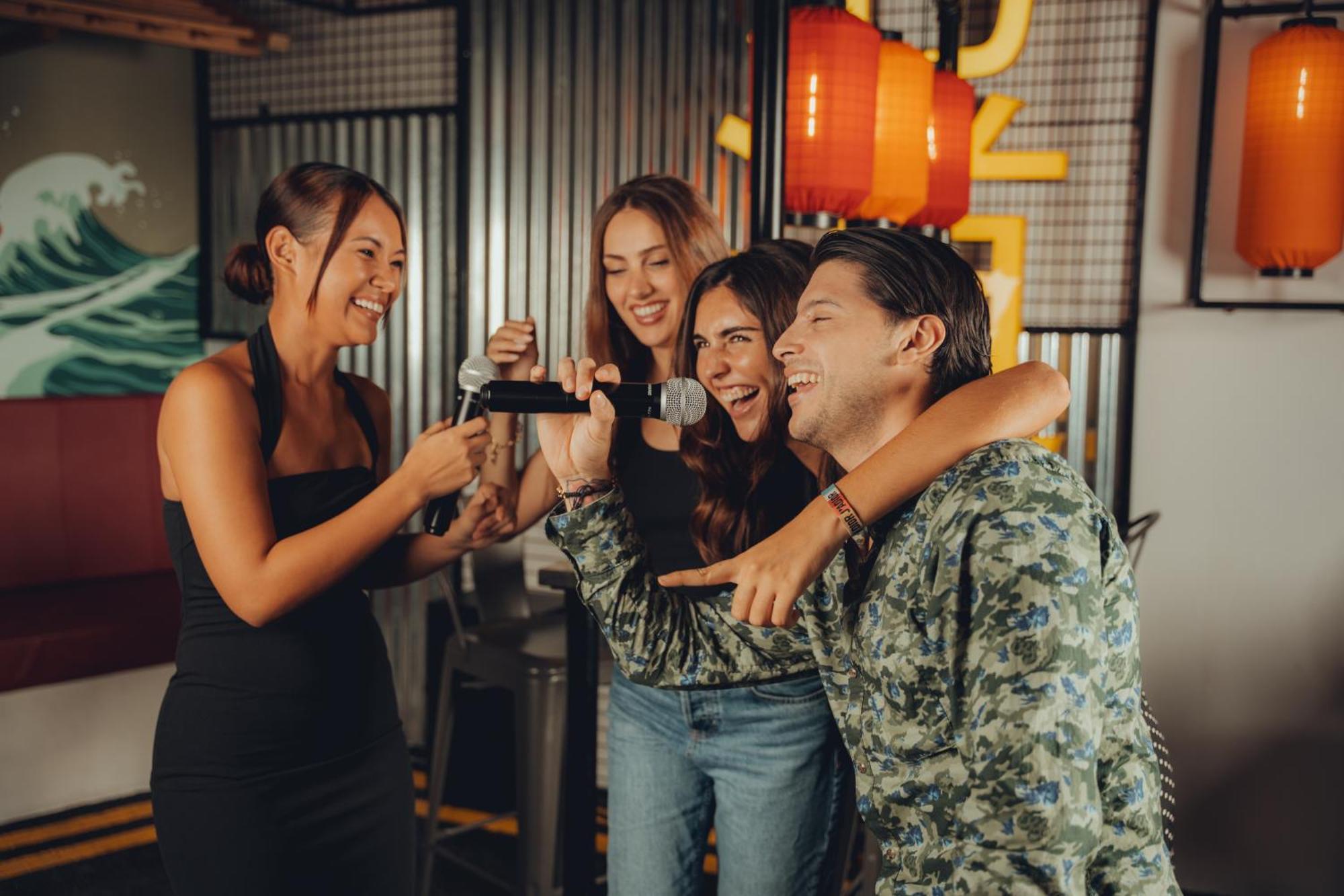 Five Jumeirah Village Dubai Exterior photo Friends having fun at a party